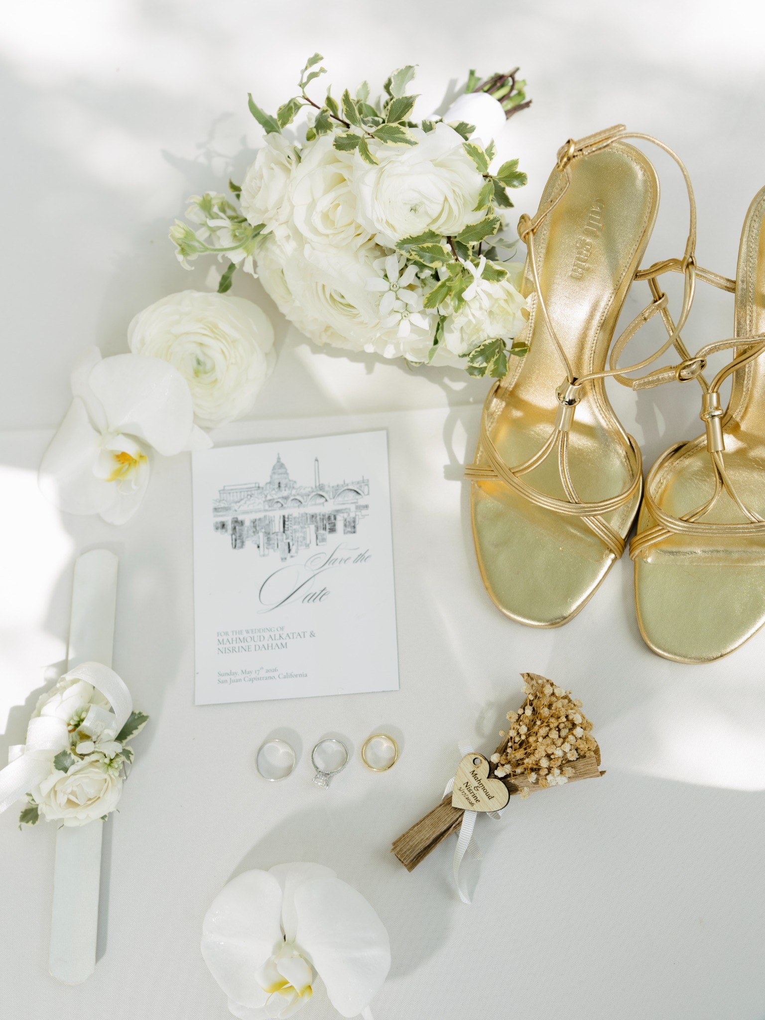 Wedding stationery, flowers and gold bridal shoes