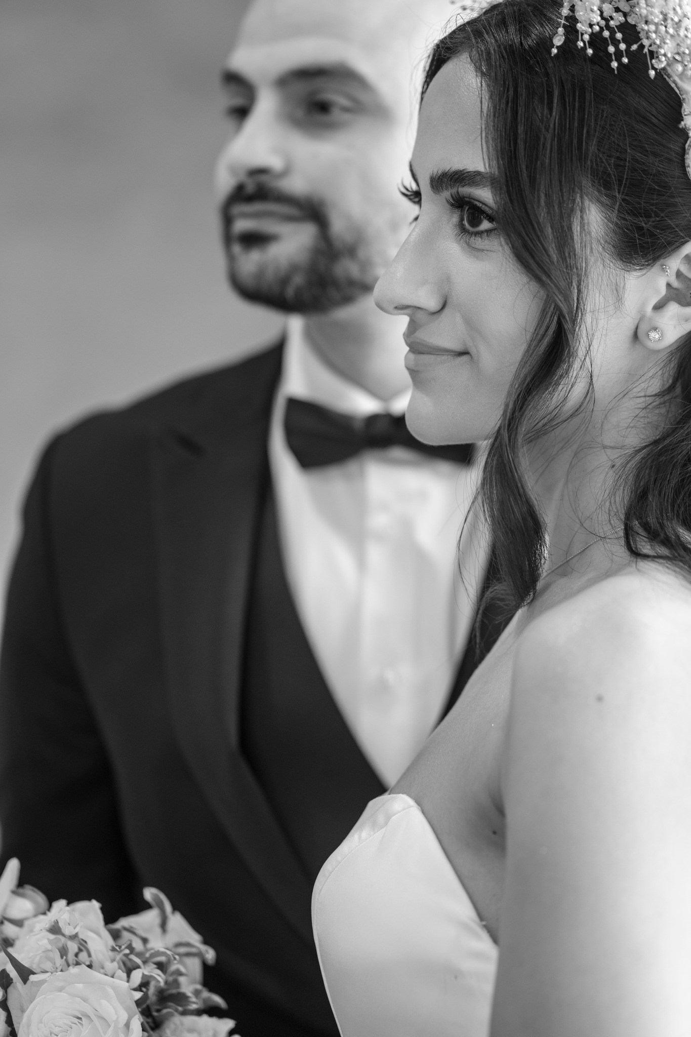 An intimate black and white portrait of the couple